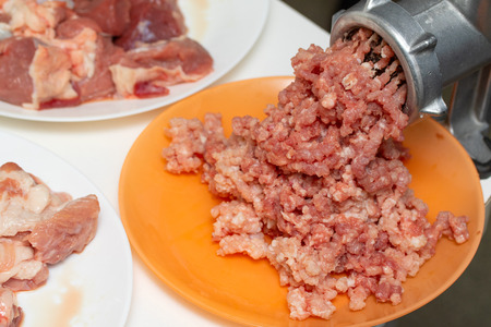 minced meat mincer plate, meat piece rawの写真素材