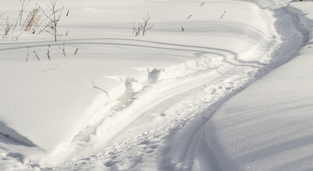 Winter landscape snow road trodden in the snow. Forest nature is winter.の写真素材
