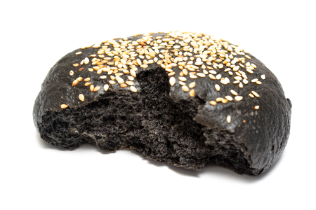 Black bun for a hamburger with sesame on a white background.の写真素材
