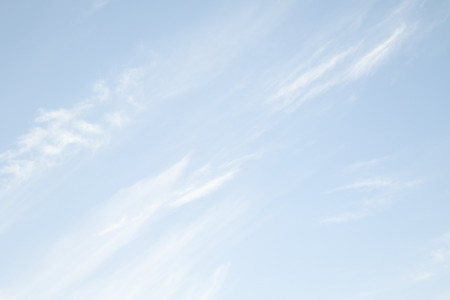 Daytime blue sky with white clouds. Sky backgroundの写真素材