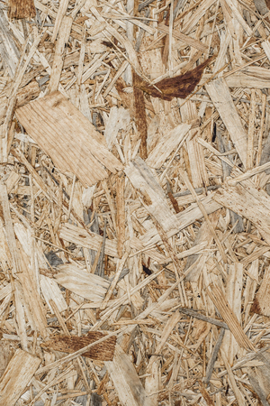 Wood panel made from wood chips texture background.の写真素材