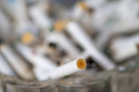 Cigarette butts are focused on the filter.の写真素材