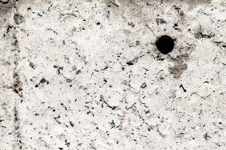 Texture of old concrete wall, cracked chipped backgroundの写真素材