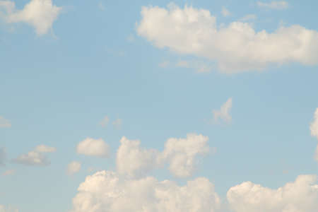 Blue sky with white beautiful cumulus clouds. Landscape sky clouds, background.