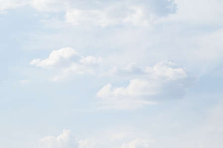 White clouds in the blue sky, day. Wallpaper.