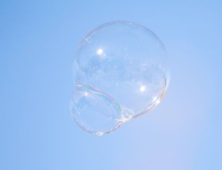 Soap bubbles against the sky.