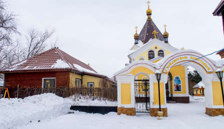 Petropavlovsk, Kazakhstan - March 6, 2019: The Christian Orthodox Church, built of stone and wood, against the sky.の写真素材
