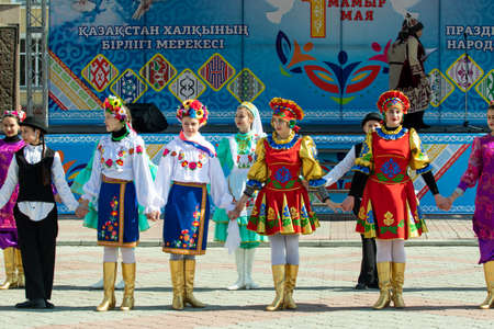 Petropavlovsk, Kazakhstan - May 1, 2019: Songs and dances in the national costumes of the peoples of Kazakhstan. May 1 in Kazakhstan is the Day of Unity of the People.のeditorial素材