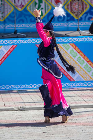 Petropavlovsk, Kazakhstan - May 1, 2019: Songs and dances in the national costumes of the peoples of Kazakhstan. May 1 in Kazakhstan is the Day of Unity of the People.のeditorial素材