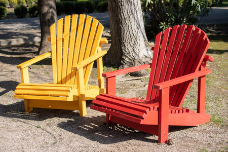 bright wooden benches for relaxing in the parkの写真素材