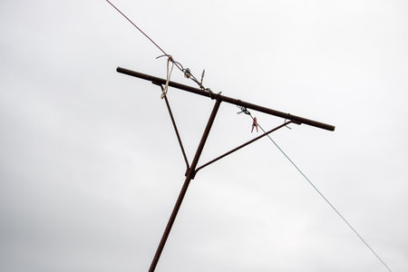 metal pipe, antenna, lamp, against the skyの写真素材