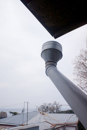 metal pipe, antenna, lamp, against the skyの写真素材