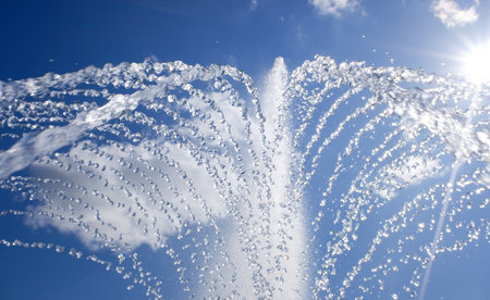 fountain against the blue skyの写真素材