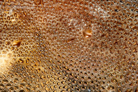 Water drops on a glass of beer close-up.の写真素材