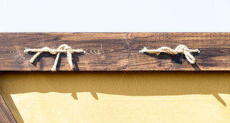 triangular roof of a house against the skyの写真素材