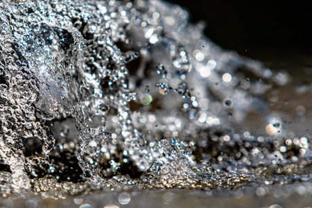 Fountain water splashes, close up, summer nature.の写真素材