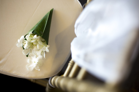 Close up of flower decorated on wedding chairの写真素材