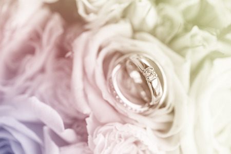 Wedding rings with rosesの写真素材