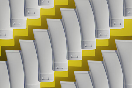 White cosmetic tubes on yellow background. template for cosmetics, minimal style 3d rendering.