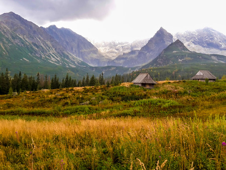 Photo of Wooden chalets in Hala Gasienicowa, High Tatras on Polish side.の写真素材