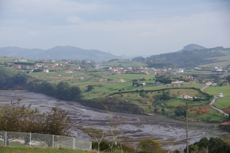 wetland estuary and mountains of Suances in Cantabriaの写真素材