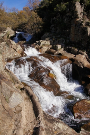 Cascade river, Gualtaminos gorge, granite rocks, white foam, wild shrubs, Villanueva, Vera, Spainの写真素材