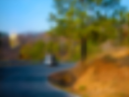 Road blurred background with blue, orange, green and turquoise road turn texture, in vectorのイラスト素材