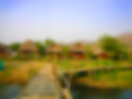 Asian blurred background with bungalos and bridge under blue sky, blurred texture, in vectorのイラスト素材