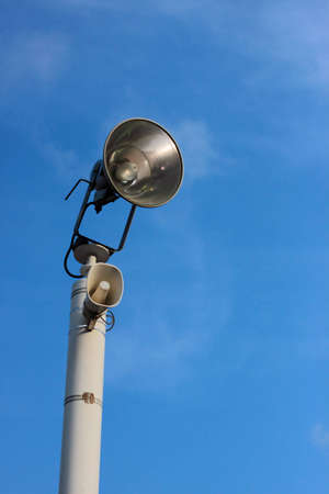 Old lamp and blue skyの写真素材