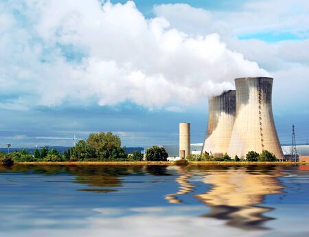 Nuclear power station in service at the edge of a river.
