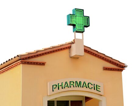 Pharmacy signboard in house facade on white background.の写真素材