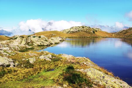 Black Lake of Alpe d 'Huez in the Alps, France.の写真素材