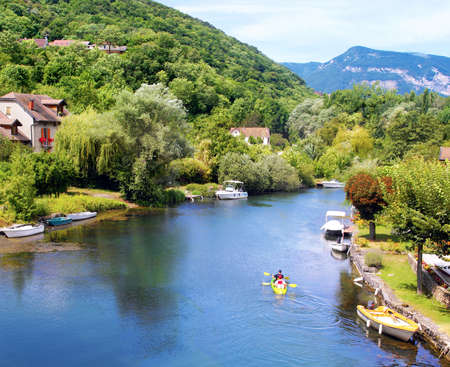 Landscape of greenery on a river of the Alps.のeditorial素材