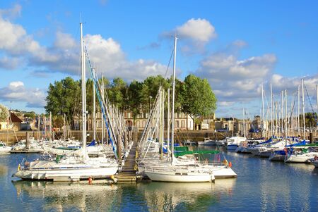 Sailboats moored at the marina of Deauville in Normandy, France.の写真素材