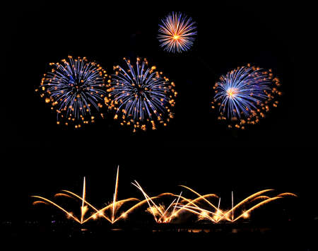 Composition of yellow and red fireworksの写真素材