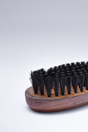 bristle brush isolated on white background, bristle wooden brush for leather shoe polish.の写真素材