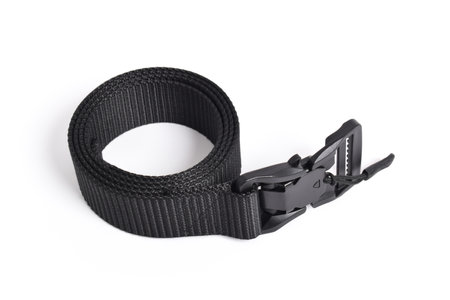 Black mens nylon fastening belt isolated on white background. Men's outdoor military tactical belt.の写真素材