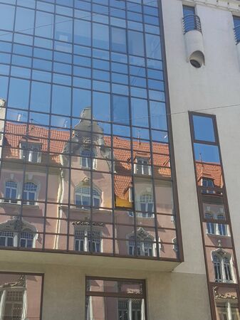 Old Art Nouveau or Jugendstil style building of Ministry of Economics and blue sky reflects in the...