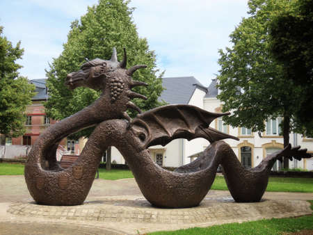Dragon of Mersch. Bronze sculpture and fountain by P.Eyschen. Mersch, Luxembourg - July 4, 2020のeditorial素材