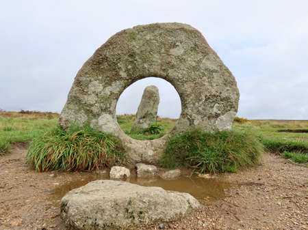 Men an Tol or Crick Stone is a standing stone with hole dating from Neolithic or Bronze Age, located in Cornwallの写真素材