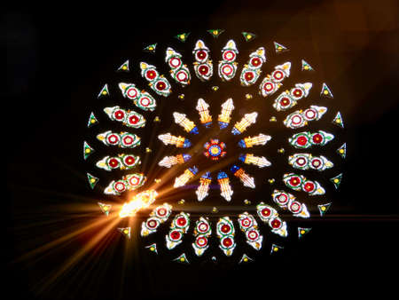 The main Rose window of York Minster - medieval stained glass with flower design and sun flare. The...