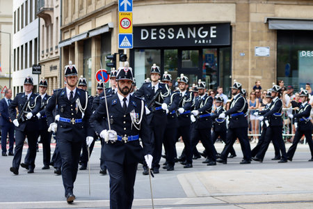Police officers marching on National day parade. Luxembourg, Luxembourg - June 23, 2022. Selective...