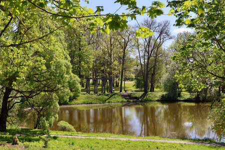 Lake in town park in Aluksne, Latvia, on a bright spring day