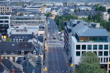Aerial of city street at dusk. Luxembourg, Luxembourg - August 28, 2022