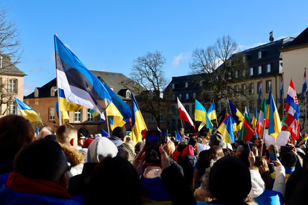 Rally in support of Ukraine on one year anniversary since the invasion. Luxembourg, Luxembourg -...