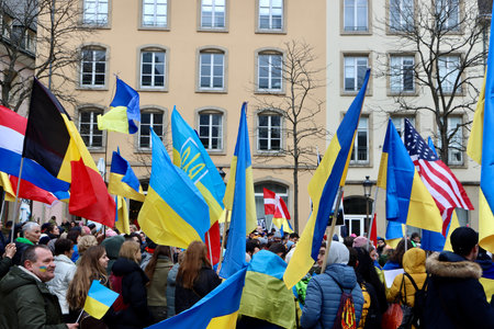 Rally in support of Ukraine on one year anniversary since the invasion. Luxembourg, Luxembourg -...