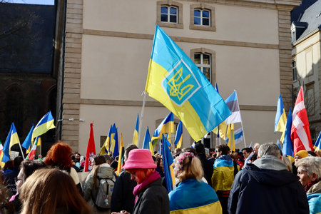 Rally in support of Ukraine on one year anniversary since the invasion. Luxembourg, Luxembourg - February 25, 2023のeditorial素材