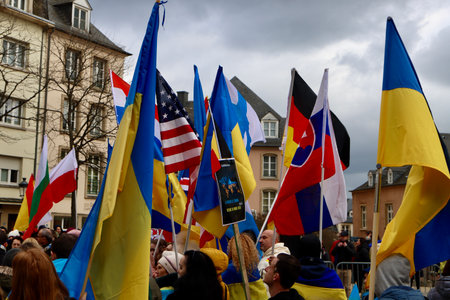 Rally in support of Ukraine on one year anniversary since the invasion. Luxembourg, Luxembourg - February 25, 2023のeditorial素材