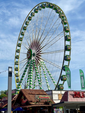 Ferris wheel by day. Schueberfouer fun fair in Luxembourg, Luxembourg - August 23, 2023のeditorial素材