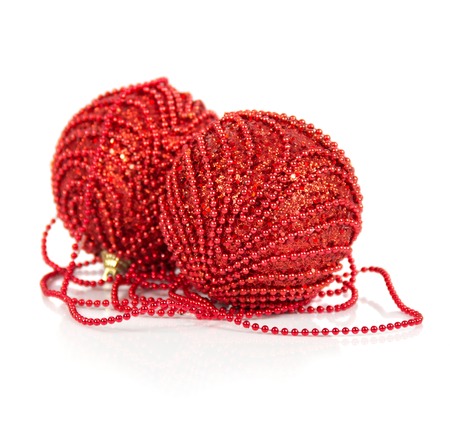 Christmas red balls isolated on whiteの写真素材